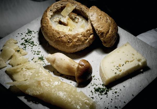Onion soup, rotzo potatoes, porcini mushrooms with asiago dop fresco cheese